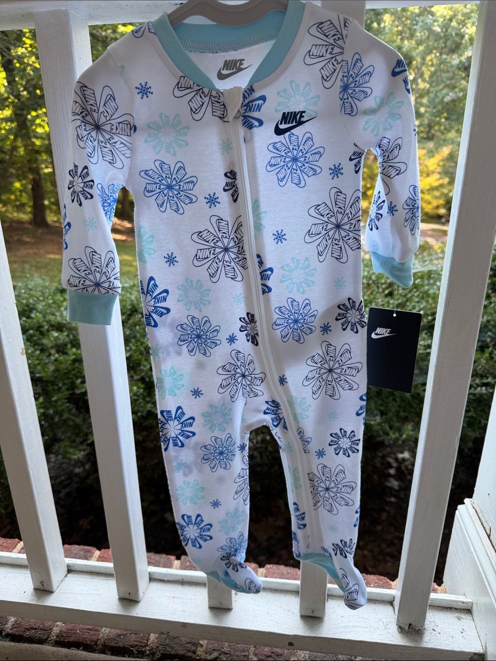 Nike White Footed Baby One-Piece with Blue and Light Blue Snowflakes
